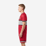 Crimson Red custom plain soccer uniform right side view displaying matching shorts hem band and crew neck detail