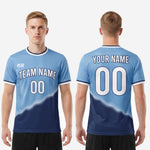 Back view of custom powder blue and navy blue soccer jersey showing back name and number print zones on sublimated jersey