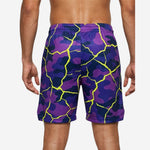 Right side view of custom printed basketball shorts in purple neon yellow showing player number placement on lower thigh panel