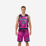 Custom printed reversible basketball uniforms showing the magenta reverse side with teal V-neck binding, team name, and number 00 on jersey and shorts
