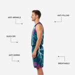 Custom printed reversible basketball uniforms magenta side panel view showing reverse side lightning graphic and teal hem binding on the shorts