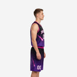 Adult male model wearing custom purple and black basketball uniforms with pink armhole binding, arched team name, and front number 00