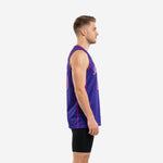 Front view of custom purple basketball jersey with pink armhole trim and sublimated team name and number 00 on solid violet body