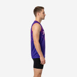 Custom purple basketball jerseys featuring V-neck collar with pink binding and bold arched team name on chest - front view