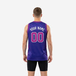 Opposite side view of sublimated purple basketball jersey with pink contrast stripe and bound armhole edge on adult male model