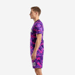 Men's custom purple digital camo soccer uniform side profile, hot pink pixel pattern, black trim crew neck