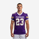 Custom purple and gold American football jersey with V-neck collar, stripe sleeve cap, team name and number 23 on chest, front view