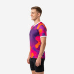 Mens custom soccer training shirt in royal purple and orange blob print, right side view showing sleeve cuff white trim