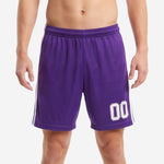 Custom purple soccer shorts with white side stripes and sublimated player number 00 on left leg, front view, adult male model