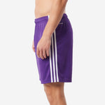 Custom purple soccer shorts with white vertical stripe panels and elastic waistband, right side view on adult male model