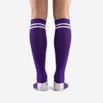 Custom purple soccer socks close-up of double white stripe cuff band detail below ribbed elastic top