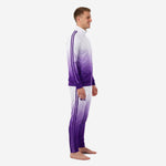 Custom purple soccer tracksuit showing twin contrast stripe detail running full length of sleeve and pant leg, left side view