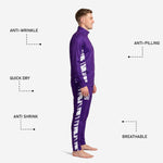 Custom purple and white soccer track pants detail showing elastic waistband tapered leg and sublimated brush-stroke side panel