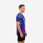 Custom purple soccer training jersey showing turquoise shard panel detail on left shoulder and sleeve cuff trim, side view