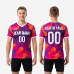 Custom soccer training shirt team name and number detail on purple and orange sublimated jersey front chest panel