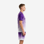 Custom purple soccer uniforms side view showing gradient fade from Royal Purple shoulders to White hem on jersey and shorts