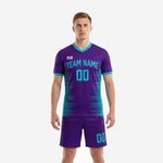 Custom purple soccer uniforms in Royal Purple and Teal with sublimated gradient stripe, team name, and player number on front - K2 Sportswear