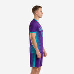 Left side view of custom purple soccer uniform showing Teal gradient transition from chest to hem and matching shorts - K2 Sportswear