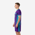 Right side view of custom purple soccer uniform with Teal side panel on shorts and V-neck collar trim detail - K2 Sportswear