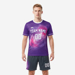 Custom purple soccer uniforms with hot pink galaxy swirl print and white crew neck trim, front view on male model