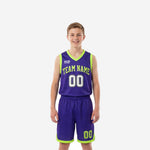 Custom purple youth basketball uniforms front and back view showing neon lime V-neck binding armhole trim and arched team name with sublimated player numbers