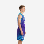 Front view of custom purple and teal youth basketball jersey and shorts with team name and number 00 on youth player