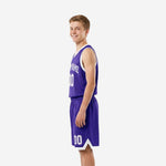 Opposite side view of purple and white youth basketball uniform set showing mesh fabric texture and matching shorts waistband detail