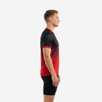Custom red and black practice jersey side profile showing black-to-red gradient and red sleeve cuff trim on male model