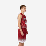 Size and specification sheet for custom red and white basketball uniforms showing available youth and adult sizing across the full roster size run