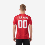 Close-up of custom red and white soccer jersey crew neck with white ribbed trim band and K2 Sportswear badge placement