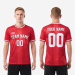 Custom red and white soccer jersey sleeve cuff detail showing white contrast trim stripe on short sleeve design