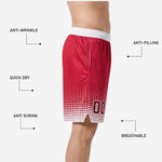 Back view of custom sublimated red basketball shorts in red and white halftone dot design with elastic waistband for youth and adult teams