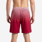 Back view of custom red basketball shorts with crimson hex-fade sublimation and elastic waistband with internal drawcord