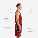 Detail view of red and black sublimated basketball uniform showing diagonal stripe, white outline bolt graphic, and scattered dot texture pattern