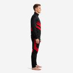 Custom red and black soccer tracksuit left side view showing red chevron panel placement on jacket and thigh on tapered pants