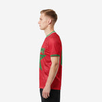 Custom red soccer shirt right side view with sublimated Kelly Green geometric star and green cuff trim, K2 Sportswear