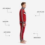 Custom red soccer tracksuit pant leg detail showing black and white triple side stripe and ribbed ankle band on tapered cut