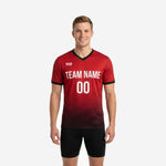 Front view of adult male wearing custom red soccer training jersey with team name and number printed in white sublimation on Crimson Black gradient