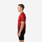 Right side view of full print custom red soccer training jersey showing Crimson Red upper body fading into Jet Black hem