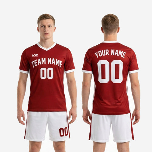Front and back view of custom red soccer uniform with team name and number on dark red jersey and white shorts