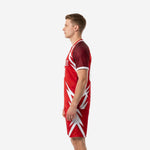 Custom red soccer outfit men right side view showing white lightning graphic on shorts and jersey side panel