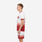 Mens custom red and white soccer uniform set, right side view, full-dye sublimation gradient kit
