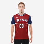 Custom soccer jersey detail showing white team name print on crimson body with horizontal white chest stripe and navy sleeve panels
