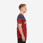 Red and white soccer jersey team left side view showing navy blue stripe sleeve cuff and crimson red body on adult male