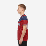 Custom men soccer jersey in crimson red and navy blue with player name and number on back, right side view