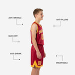 Second side view of custom red youth basketball uniform showing pointed gold chevron hem panel on shorts leg and number 00 on left leg