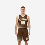 Custom reversible basketball uniform sets in chocolate brown with cream halftone dot fade, arched team name and front number on brown side, adult male model front view