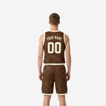 Brown custom reversible basketball uniform set side view showing contour line pattern across the jersey side panel and shorts