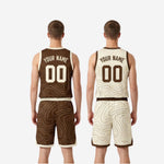 Size and specification chart for custom reversible basketball uniform sets in brown and cream, youth and adult sizing