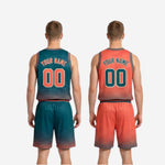 Full set detail of custom reversible team basketball uniforms showing teal and orange sublimated halftone dot design on jersey and matching shorts